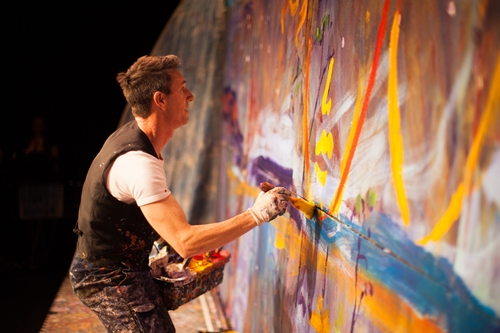Phil Doncon painting live on stage
